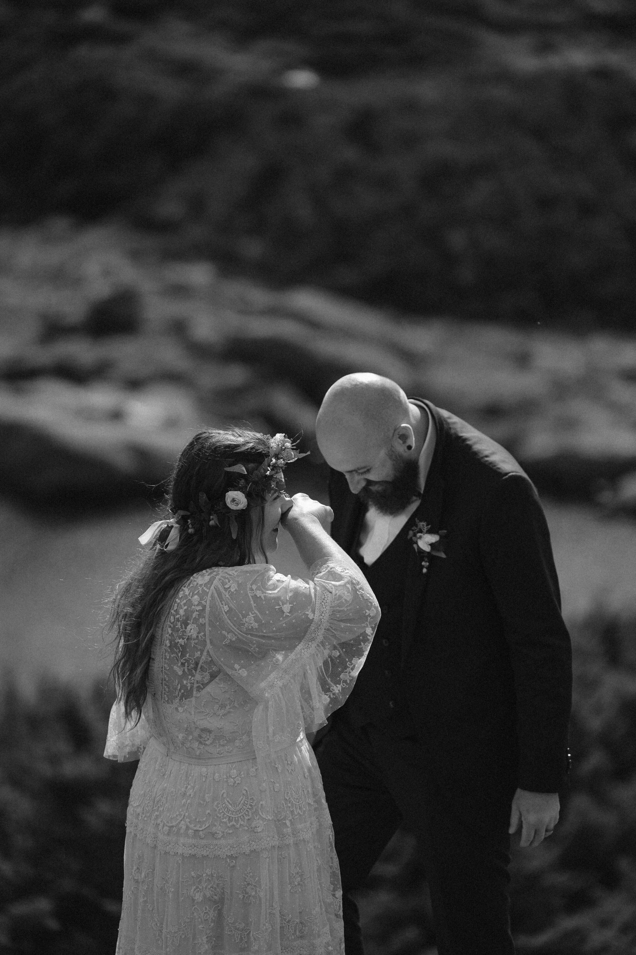 a bride and groom crying as their share their vows during their Mount Washington elopement